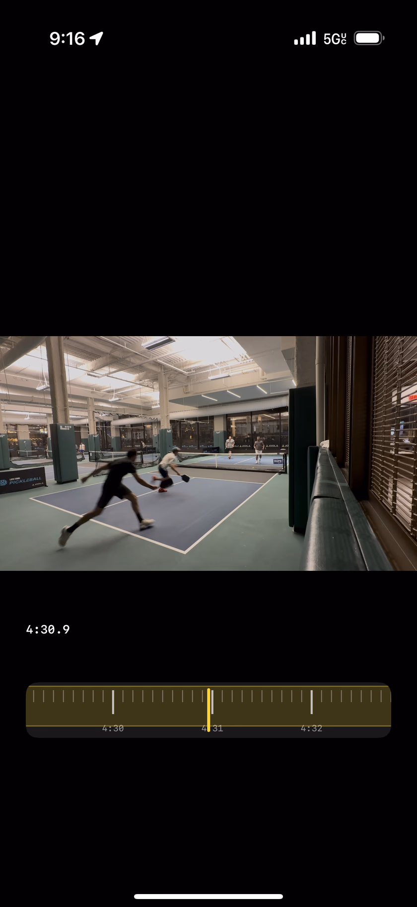 Scrubbing in Replay Rally: the controls fade, leaving the time readout 4:30.9 and the jog wheel, while a player lunges for a low ball.
